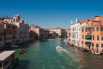 Views of the most beautiful canal of Venice - Grand Canal water streets, boats, gondolas, mansions along. Italy.