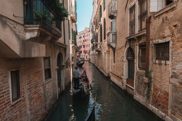 Fototapeta na wymiar A serene gondola ride through the picturesque canals of Venice, showcasing the charming architecture and timeless beauty of the iconic waterways. Experience the enchanting old-world charm of Venice.