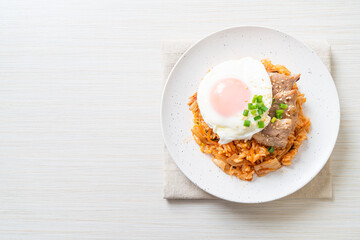 Kimchi fried rice with fried egg and pork