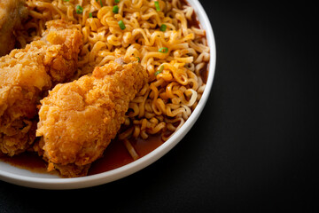 Korean instant noodles with fried chicken or Fried chicken ramyeon
