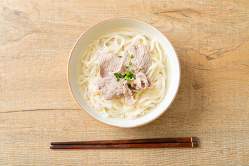 udon noodles with pork in clear soup