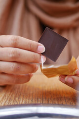 removing packet from a chocolate 