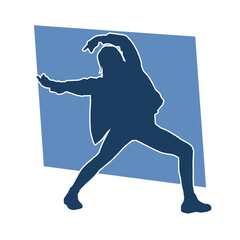 Silhouette of a casual female in a dancing pose. Silhouette of a dancer woman in action pose.
