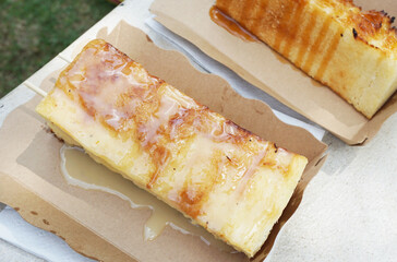 close up of a bread grilled and milk sauce