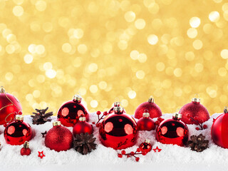 red christmas balls long frame on snow