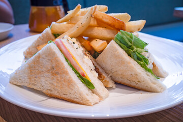 Truffle egg sandwich on white plate