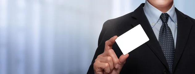 Foto op Plexiglas 白いカードを持っているビジネスマン © hanahal