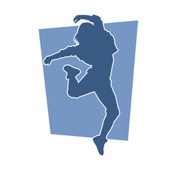 Silhouette of a casual female in a dancing pose. Silhouette of a dancer woman in action pose.