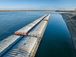 barges on the Ohio River at confluence with the Mississippi below Cairo, IL, November aerial view