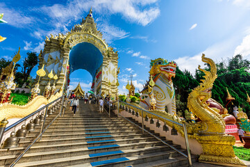 Wat Saeng Kaeo Phothiyan-Chiang Rai:12November2023,atmosphere inside the temple area,there are tourists of many nationalities stopping by to make merit and admire the beauty of the sculptures thailand - obrazy, fototapety, plakaty