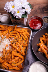 High Angle view of Air fried sweet potato fries Background on a tray