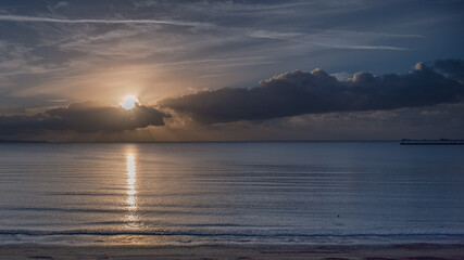 sunset over the calm sea
