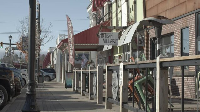 Artisan Village store in downtown Grayling, Michigan with stable establishing shot.