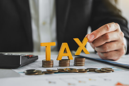 Business TAX plan development for fill in the income tax online return form for payment. Financial research,government taxes and calculation tax return concept.
