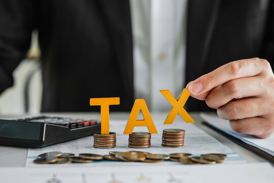 Business TAX plan development for fill in the income tax online return form for payment. Financial research,government taxes and calculation tax return concept.