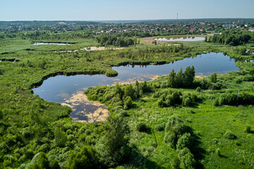 Aerial view of a peat bog. Factory swamps on the outskirts of the city of Borovsk, Russia