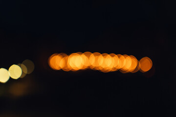 Bokeh of orange lanterns at night