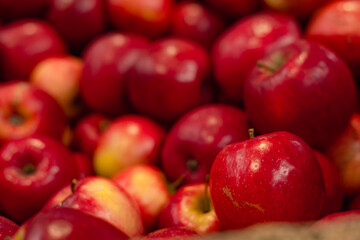 red apples in a market, retail shop for food and vegetables