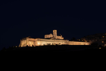 nighttime view of the Basilica of San Francesco d'Assisi