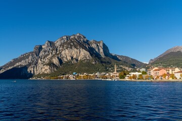 Lecco on the shores of Lake Como with mountain landscape in the background