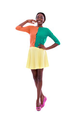 Portrait, fashion and retro with a trendy black woman isolated on a transparent background for colorful style. Smile, bright and happy with a confident young model on PNG in a multicolor outfit
