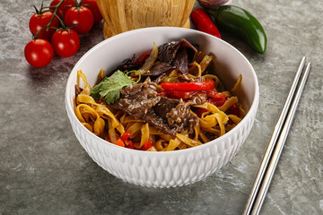 Asian wok with noodle, vegetables and beef