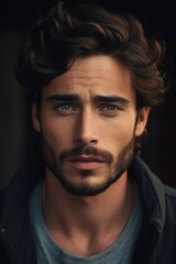 Fototapeta premium The handsome individual in a contemplative mood, their smart eyes reflecting deep thoughts. The HD camera captures the complexity of their emotions, creating a powerful and introspective image.