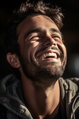 Obraz premium The handsome individual in a candid moment, their laughter echoing genuine joy. The HD camera captures the sincerity of their smile, making it a heartwarming and delightful image.