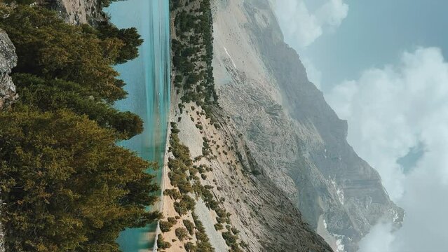 The Alaudin (Chapdara) lakes, lying at an altitude of 2800 m, are considered one of the most beautiful lakes of the Fan Mountains. Turquoise mountain lake. Pamiro-Alai. Tajikistan, Pamir 4K