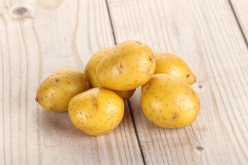 Raw young baby potato heap