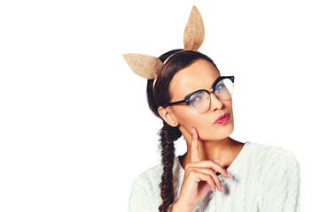 Woman, portrait and thinking bunny ears for thoughts decision, problem solving or isolated on...