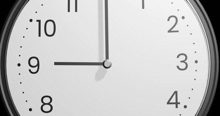White clock showing 9 o'clock on white background