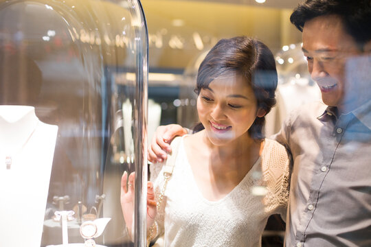 Sweet couple in jewelry store