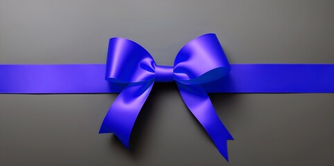 Top view of blue ribbon with a bow for a present, gift box on a gray background. Concept of Christmas, birthday, anniversary, Xmas, Valentine's Day, proposal