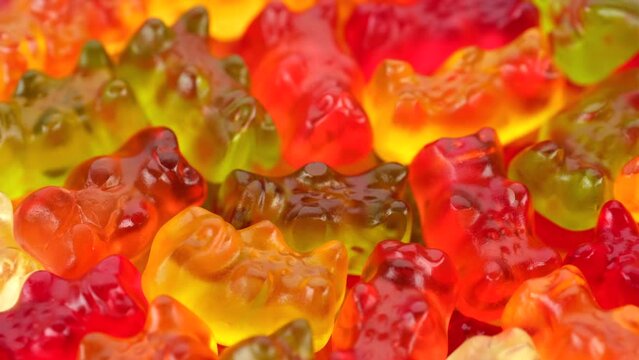 Sweet colorful gummy candy close up, rotation
