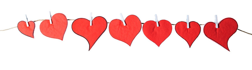 Red paper hearts on rope, isolated on white or transparent background cutout.