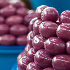 Macro photography of black olives in the covered central market of Arequipa, Peru.