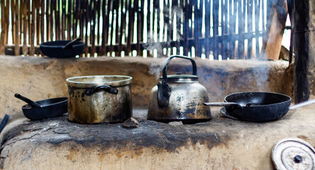 Rural traditional kitchen in an adobe house in the village of San Juan de Chuccho, Colca Canyon,...