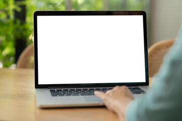 Blank display screen monitor with women using laptop computer for advertise.