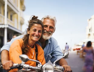 Foto op Canvas A senior couple on holiday in a sunny country enjoy a scooter ride along the coast, smiling as they look at the camera. Generative ai © jackfrog