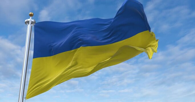 Ukraine flag with flagpole waving in wind, rolling clouds background looping, 4K video (Perfect Loop)
