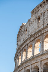Fototapeta premium Exterior Panorama of the Roman Colosseum on a sunny day in Rome, Italy