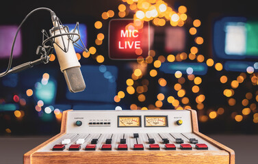 professional microphone and mixer in radio studio with christmas decor
