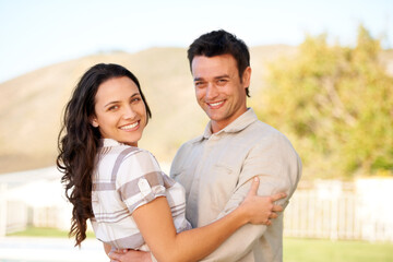 Couple, happy and portrait with hug and garden with joy, smiling and young people. Marriage,...