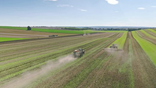 Machines till the fields for the coming harvest year