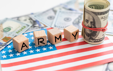 Obraz premium Rolls of money dollars on USA American flag. Finance, payment, trade, financial transactions concepts