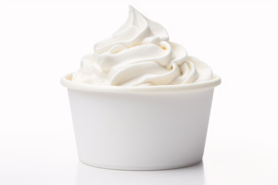 Soft serve vanilla ice cream in cup on white background