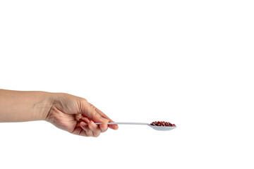 Red beans isolated on spoon plastic in hand on transparent background