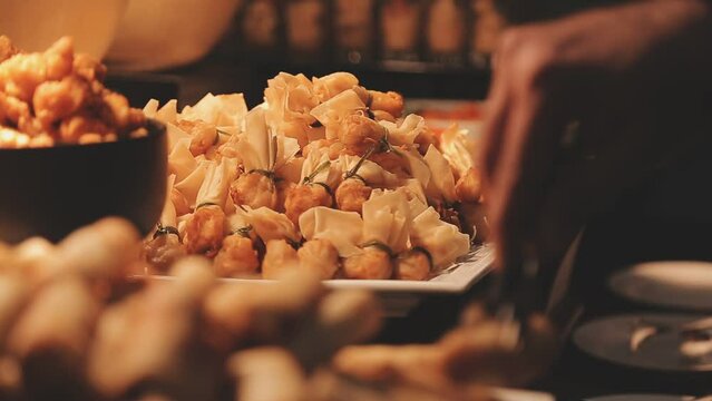 Food buffet catering lunch time seminar party with many hand of people in luxury restaurant