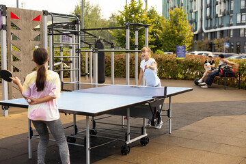  Photography of table tennis area in the public park. Street ping-pong sports competitions in...